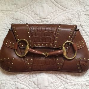 Gucci bohemian studded leather clutch